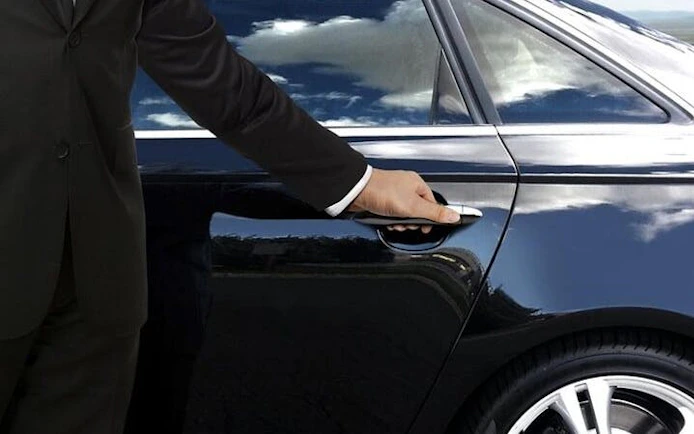 Private car door being opened for Agadir to Marrakesh transfer.