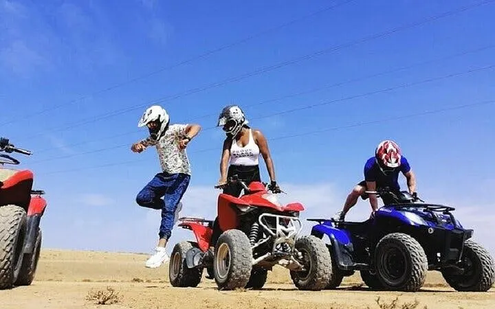 ATV riders preparing for adventure at Palmeraie Desert, Marrakesh.
