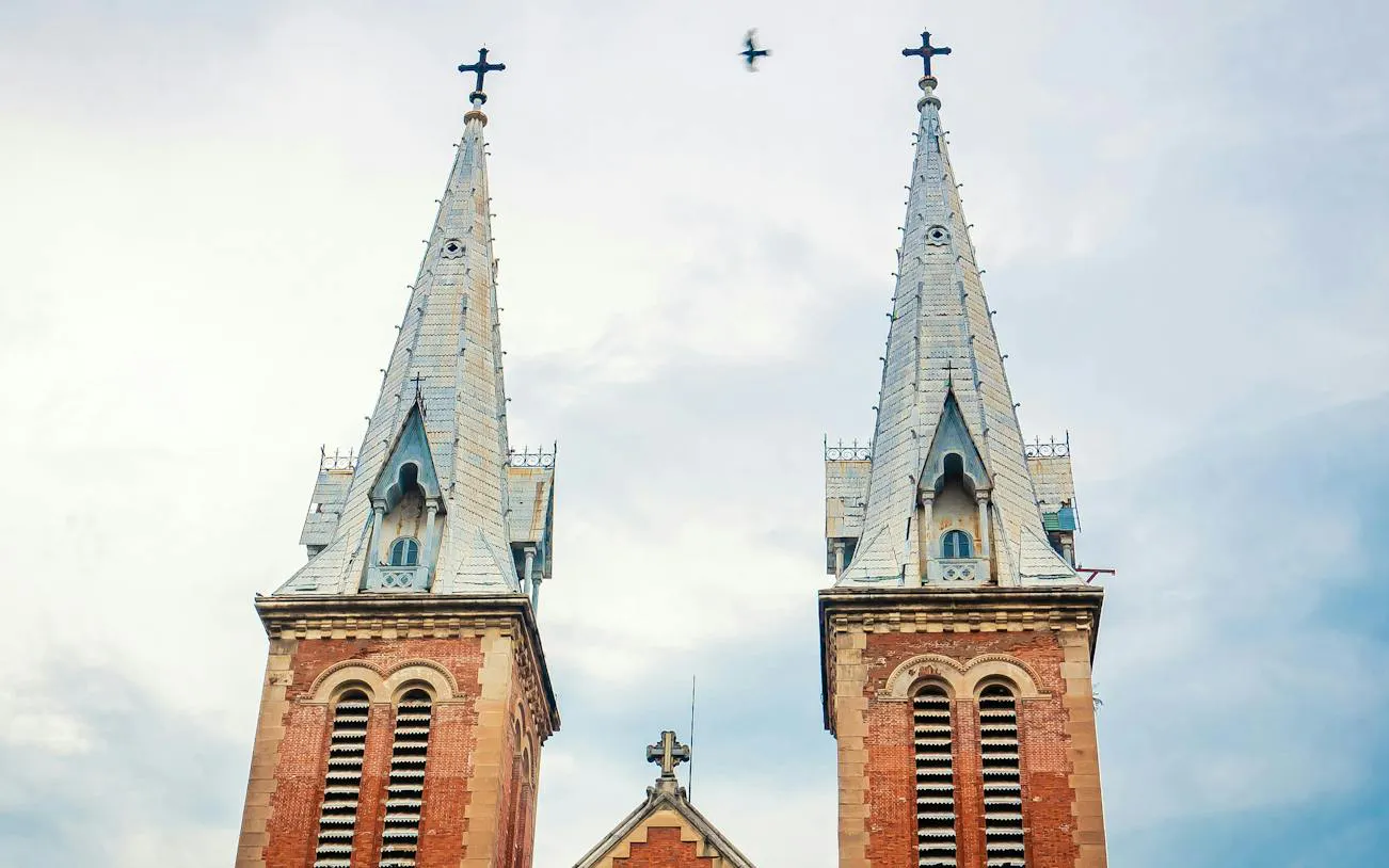 Notre-Dame Cathedral Basilica spires in Ho Chi Minh City's French Quarter.