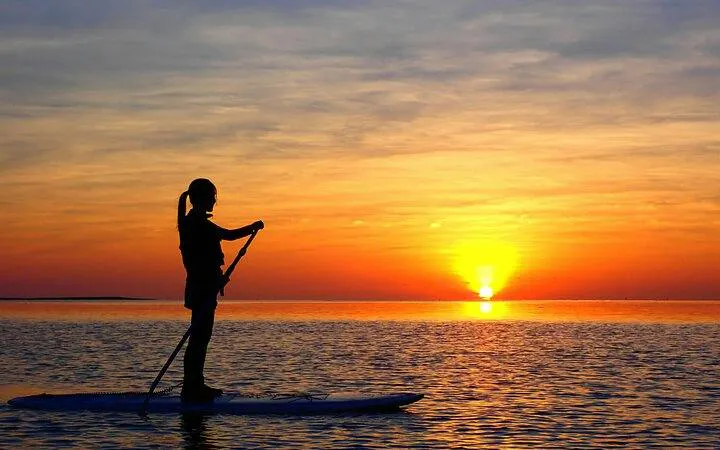 Paddleboarder at sunset on Ishigaki Island, Okinawa.