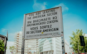 Checkpoint Charlie sign in Berlin, marking the former border crossing between East and West Berlin.