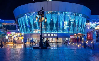 Culturama building illuminated at night, Sharm El Sheikh city tour.