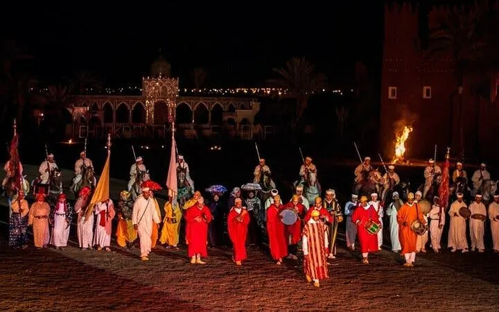 Performers in traditional attire at Chez-Ali Fantasia Folklore Show, Marrakesh.