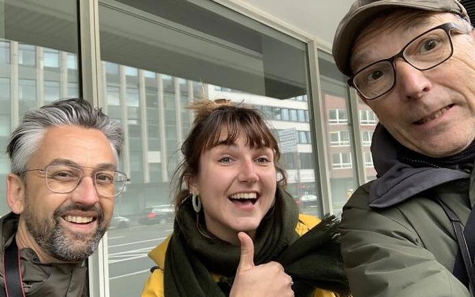 Three people smiling during the Haunted Cologne self-guided city exploration game.