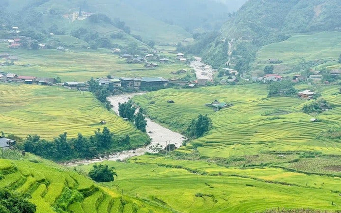 Sapa valley with terraced rice fields and river, view from Giay stilt house, Vietnam.