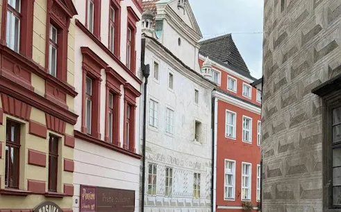 Street view of colorful historic buildings in Cesky Krumlov, Czech Republic.