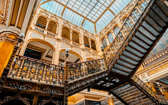 Ornate staircase and balconies in Porto's historic center, Portugal.