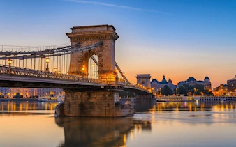 Chain Bridge over Danube River at sunset, Budapest Self-Guided Walking Tour.