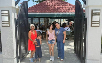 Little Havana tour group at outdoor cafe in Miami, showcasing Cuban culture and community.