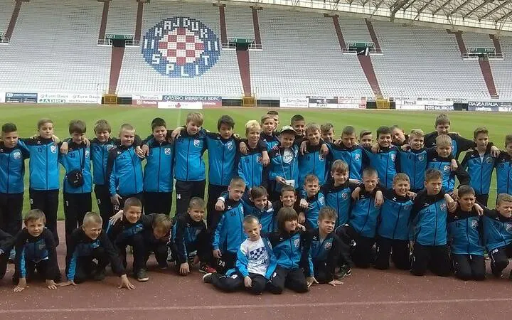 Youth soccer team at Poljud Stadium, Split during a tour.