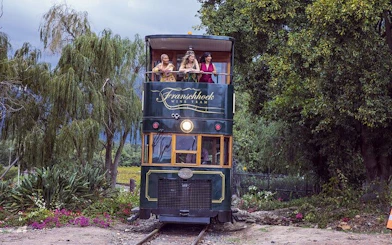 From Cape Town: Franschhoek Wine Tram Hop-on-Hop-off Tour with Return Transfers