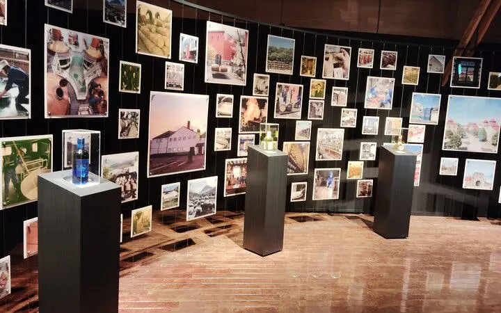 Yoichi whisky exhibit with historical photos at Nikka’s coastal site in Japan.