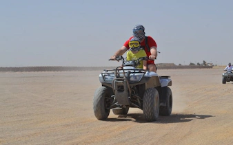 ATV riders on desert safari near Sharm El Sheikh.