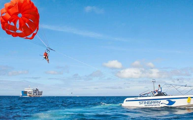 Parasailing over the Red Sea with speedboat in Hurghada, Egypt.