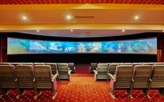 Cultural theater with panoramic screen in Sharm El Sheikh during private city tour.