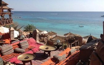 Luxurious seating area overlooking the Red Sea at Farsha Cafe, Sharm El Sheikh.
