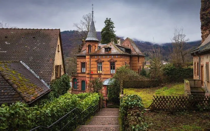 Heidelberg historic building along a cobblestone path on a self-guided walking tour.