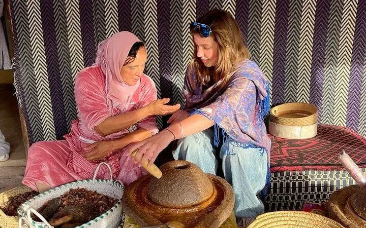 Local woman teaching traditional cooking in Essaouira, Morocco.