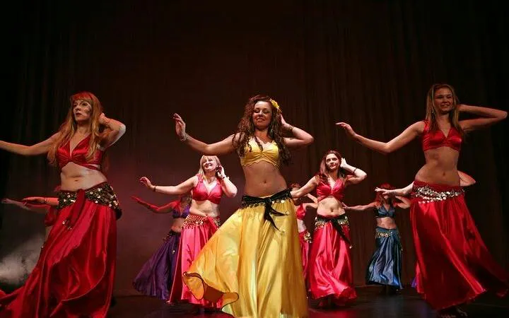 Cabaret dancers performing on stage during a night show in Hurghada.
