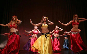Cabaret dancers performing on stage during a night show in Hurghada.