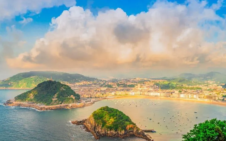 San Sebastian coastline with La Concha Bay and cityscape, view from Monte Igueldo.