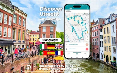 Utrecht canal view with mobile app map for self-guided walking tour.
