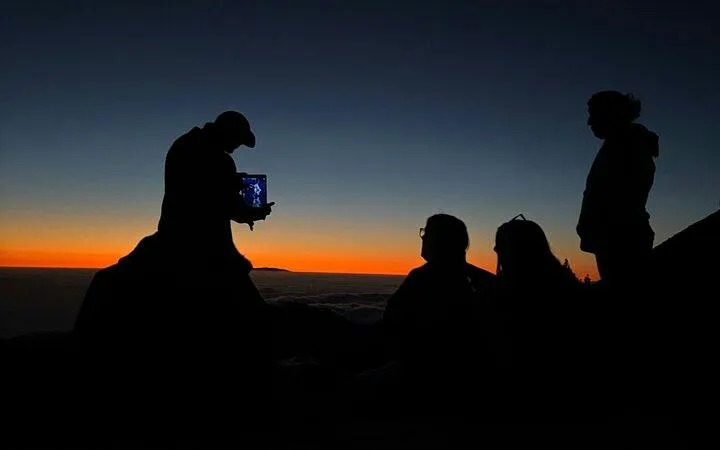 Sunset stargazing tour group at Teide National Park, Tenerife.
