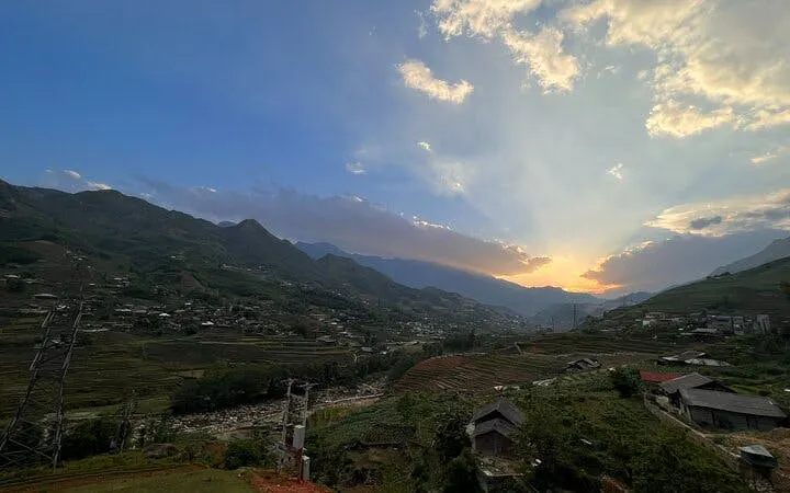 Sapa valley at sunset with rice fields and village houses, Vietnam.