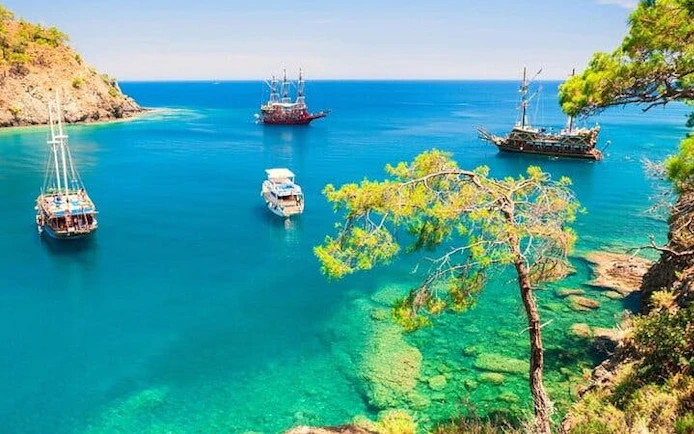 From Antalya to Kemer Mega Star Boat Trip Lunch & Hotel pick up