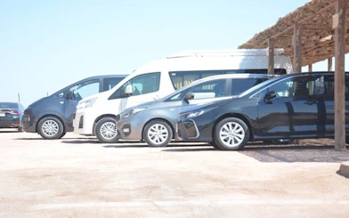 Airport transfer vehicles parked in Hurghada for hotel service.