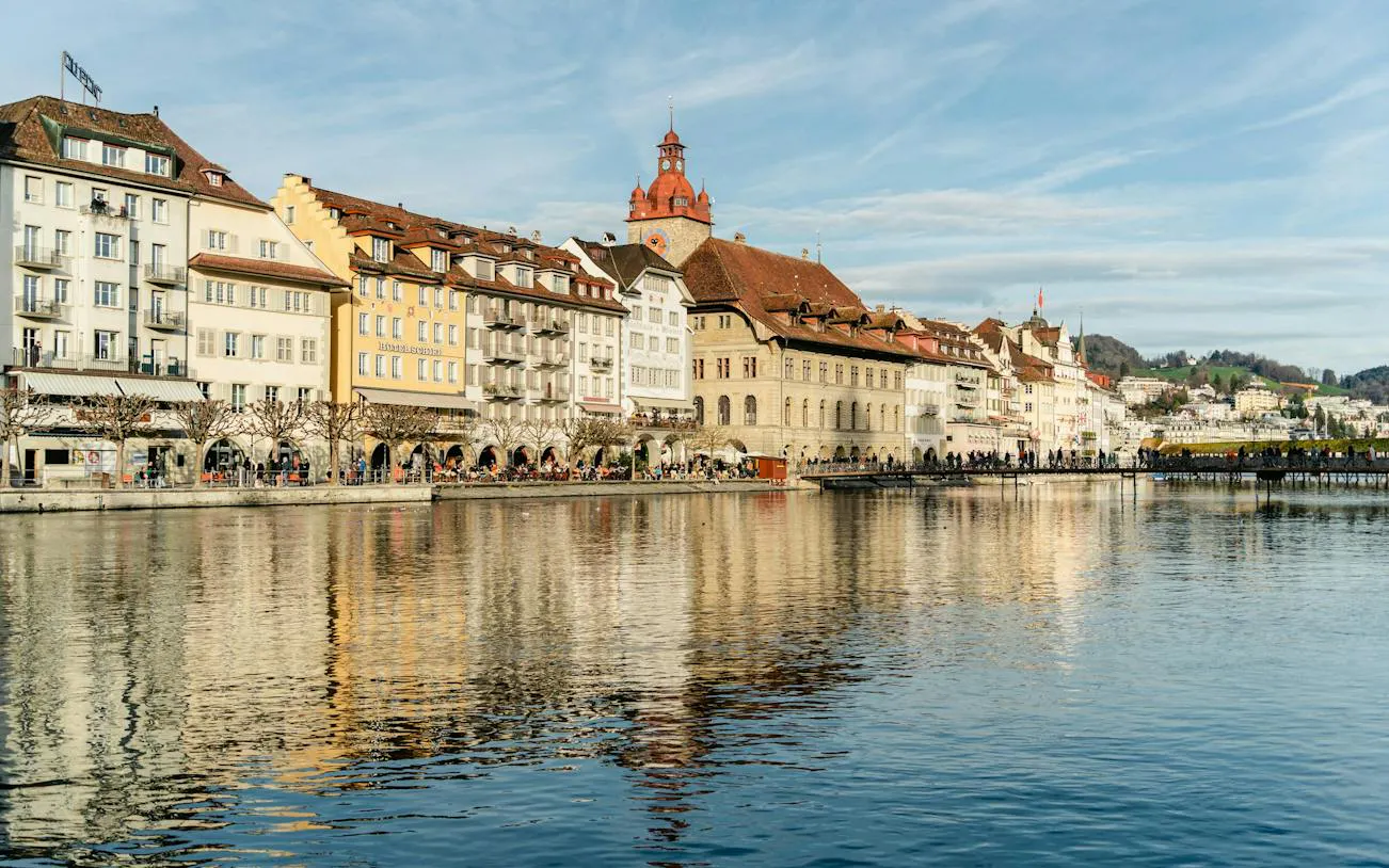 Riverside view of historic buildings in Lucerne Old Town, Switzerland.