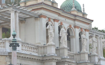 Buda Castle District statues and architecture on self-guided city exploration game.