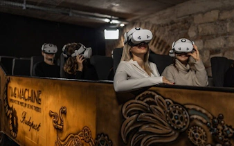 Visitors wearing VR headsets at Time Machine Budapest immersive historical exhibition.