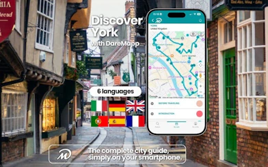 York self-guided walking tour app interface on historic street.
