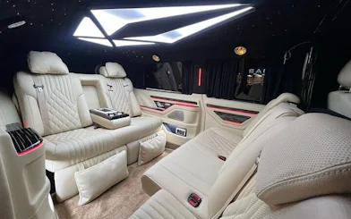 Luxurious interior of a private transfer vehicle at Antalya Airport.