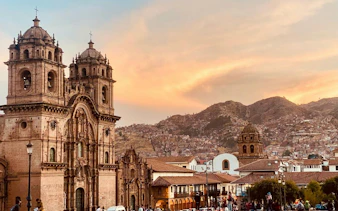 Cusco Cathedral and surrounding buildings at sunset, Cusco Historic Center.