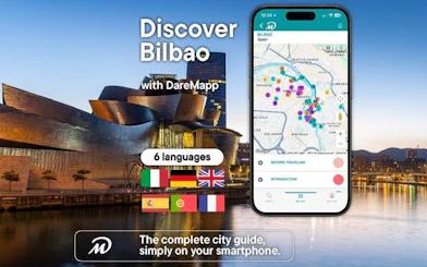 Bilbao Guggenheim Museum with mobile app map for self-guided walking tour.