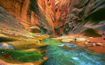 Blue Hole Canyon with flowing water and rocky walls, Sharm El Sheikh tour.