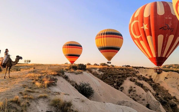 Cappadocia Camel Ride Tour with Sunrise Hot Air Balloon Views and Hotel Transfers