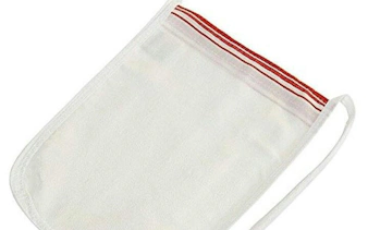 Exfoliating mitt used in Istanbul Turkish bath experience.