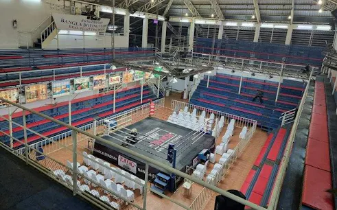 Bangla Boxing Stadium interior with Muay Thai ring and seating in Phuket, Thailand.