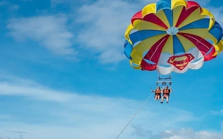 Parasailing over the sea with colorful parachute, Sharm El Sheikh.