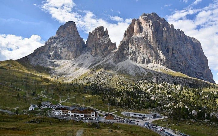Dolomites mountain range with village and panoramic viewpoints, seen from Verona tour.