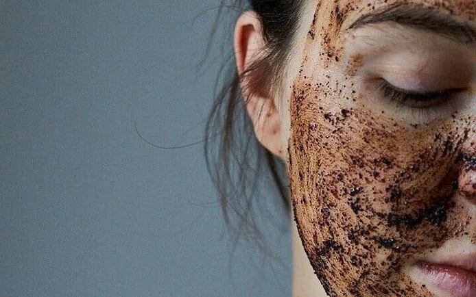 Moroccan Hammam facial treatment with natural scrub in Marrakesh bathhouse.