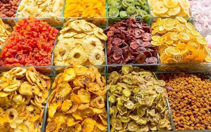 Dried fruits displayed at Sapa local market during guided tour.