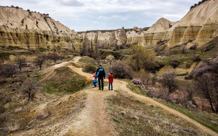 Trekking through scenic valleys and rock formations in Cappadocia.