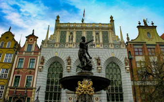 Neptune Fountain in front of Artus Court, Gdansk Old Town, on self-guided audio walking tour.
