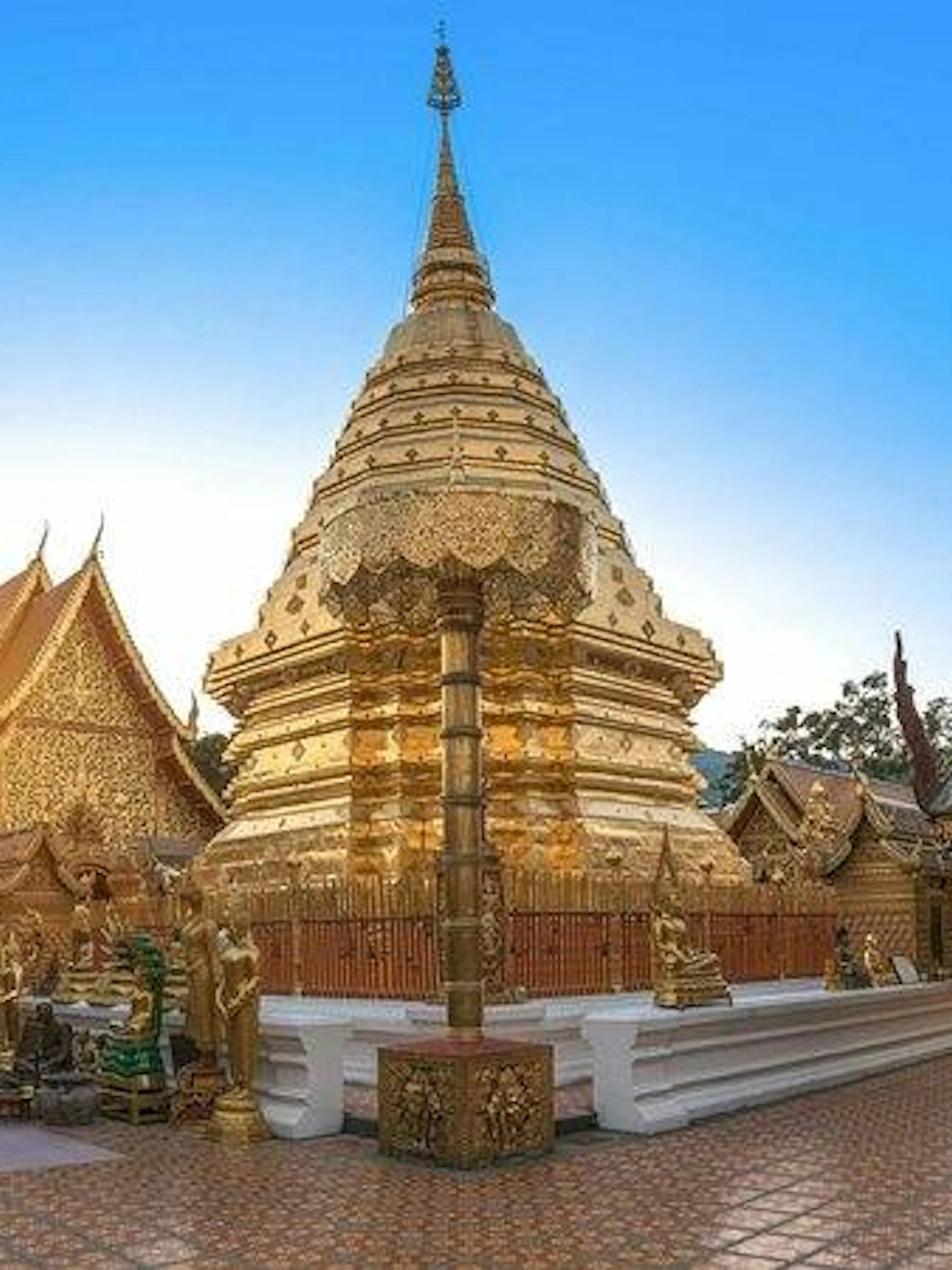 Golden pagoda and temple structures at Wat Phra That Doi Suthep, Chiang Mai.