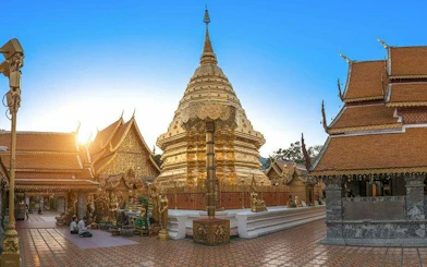 Golden pagoda and temple structures at Wat Phra That Doi Suthep, Chiang Mai.