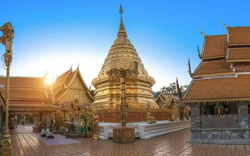 Golden pagoda and temple structures at Wat Phra That Doi Suthep, Chiang Mai.